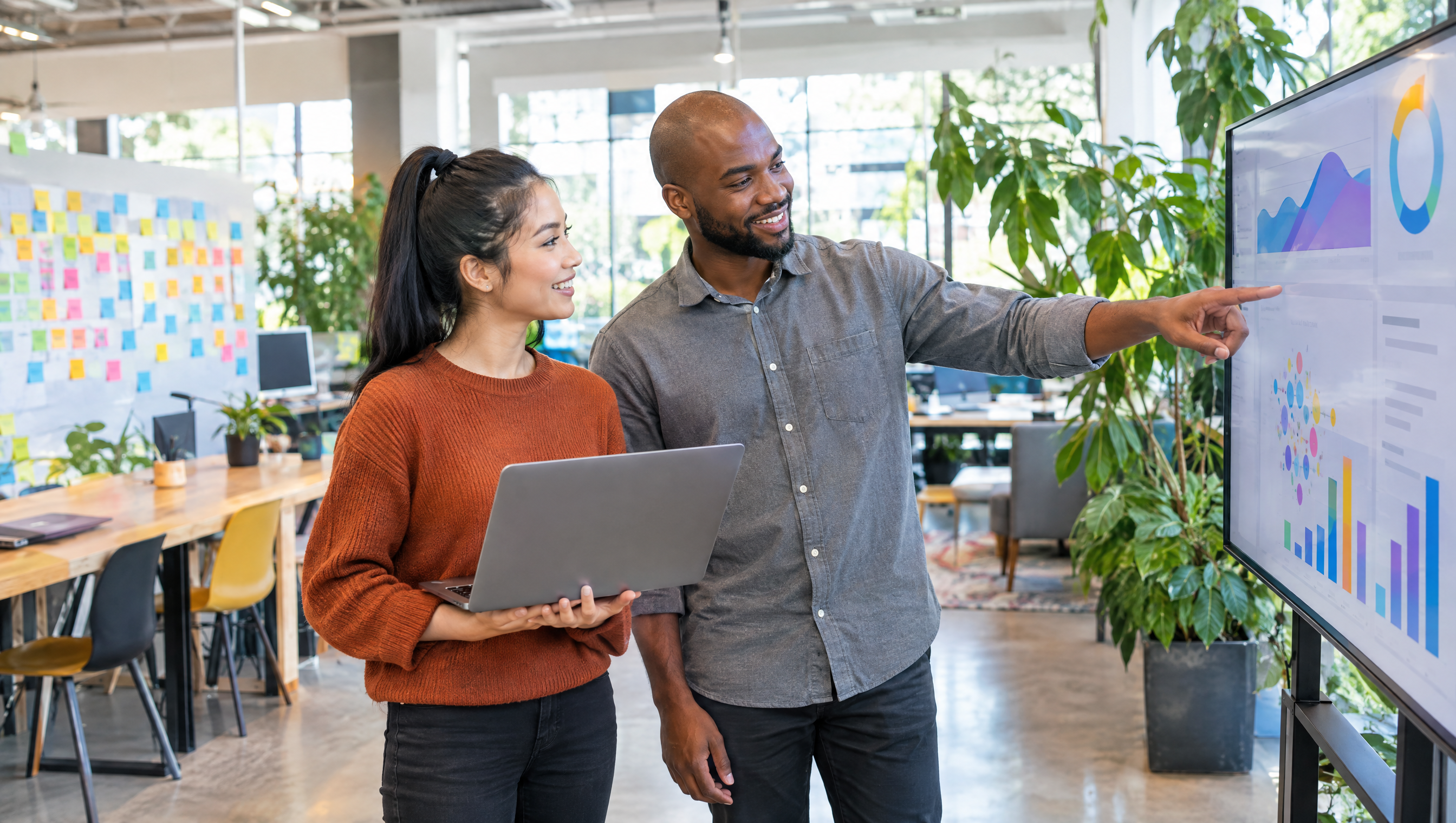 IBM vs Accenture graduate scheme: two technology consultants in an innovation studio